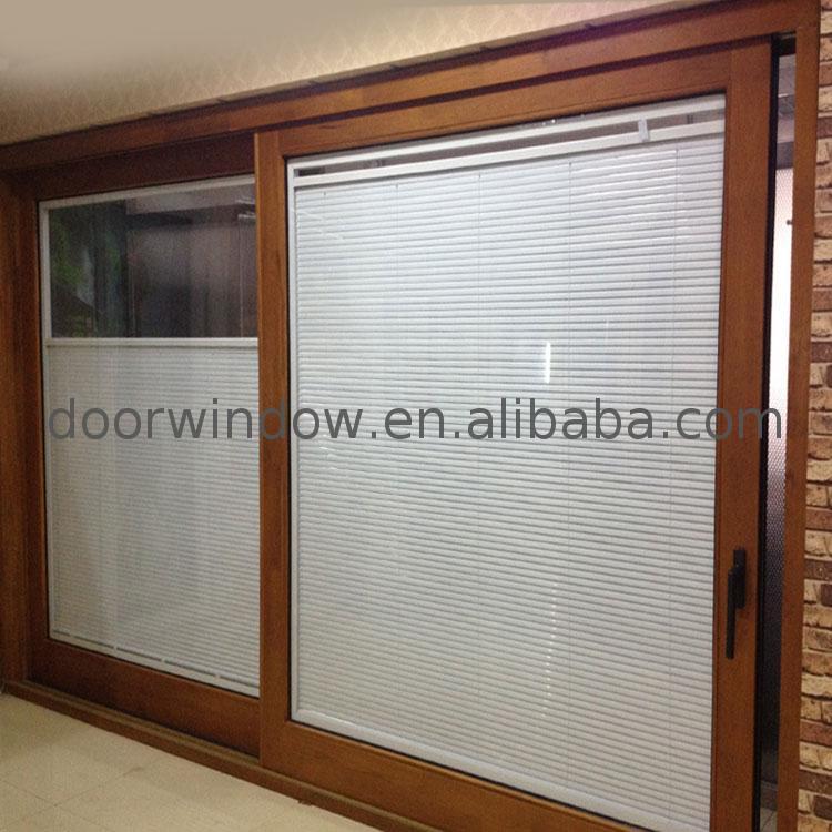 DOORWIN 2021Chinese factory timber folding sliding doors three panel patio door pane