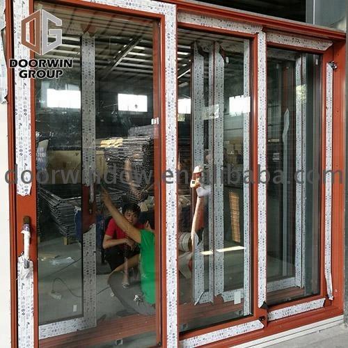 DOORWIN 2021glass door double glazed sliding wrought iron design window film doors by Doorwin on Alibaba