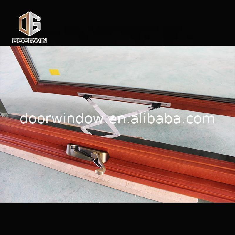 Doorwin 2021-American casement window grill design wooden crank open outward arched top window by Doorwin on Alibaba