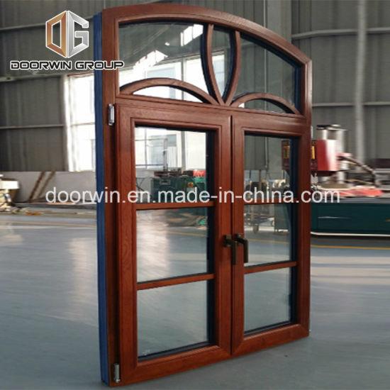 DOORWIN 2021Oak wood clad thermal break aluminum window arched casement French window with grille design