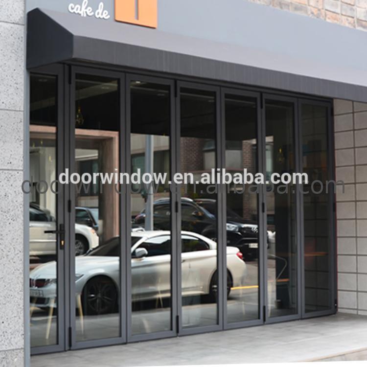 Doorwin 2021Australia standard exterior aluminium bi-folding doors aluminum wood folding patio bi fold by Doorwin on Alibaba