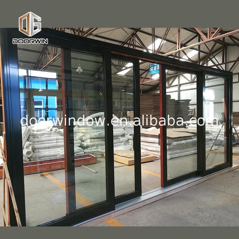 Doorwin 2021Best selling products wooden double door designs soundproof folding partition sliding price by Doorwin on Alibaba