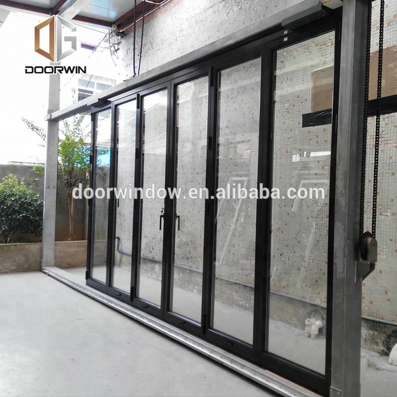 Doorwin 2021Bifold aluminium doors bi folding wood fold door prices by Doorwin on Alibaba