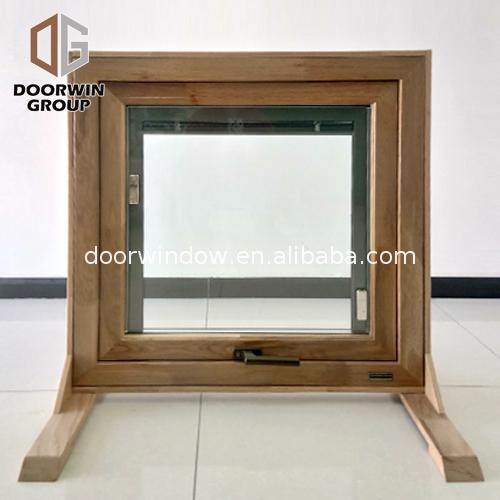 Doorwin 2021China Factory Seller aluminum awning window with wood frame manufacturers alloy top hung windows