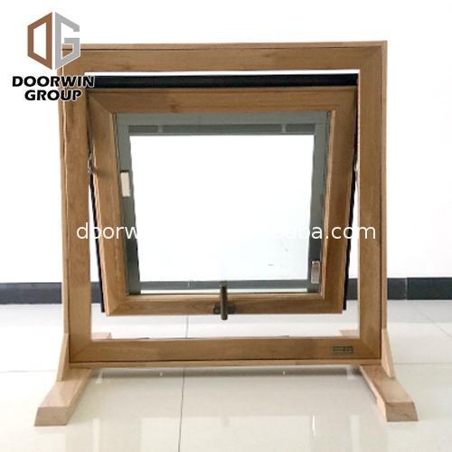 Doorwin 2021China Factory Seller aluminum awning window with wood frame manufacturers alloy top hung windows