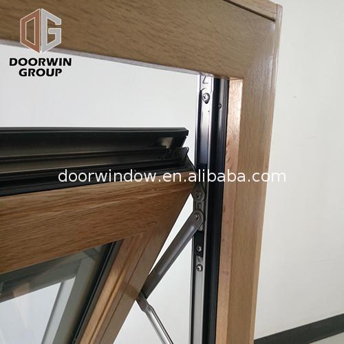 Doorwin 2021China Factory Seller aluminum awning window with wood frame manufacturers alloy top hung windows