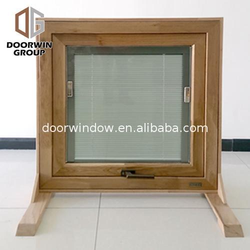 Doorwin 2021China Factory Seller aluminum awning window with wood frame manufacturers alloy top hung windows