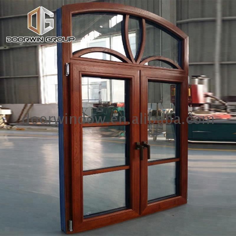 DOORWIN 2021Double glass arched design window iron grills decorative metal by Doorwin on Alibaba