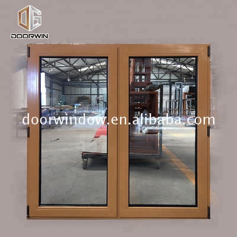 DOORWIN 2021Double glazed aluminium wood composite door and windows frame decorative aluminum cladding doors by Doorwin on Alibaba