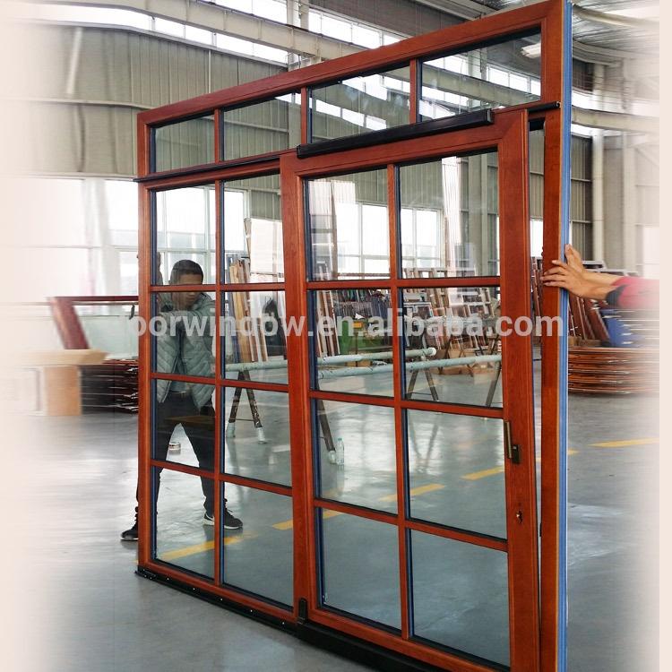 DOORWIN 2021European sliding glass door entrance slide energy saving aluminium hanging by Doorwin on Alibaba