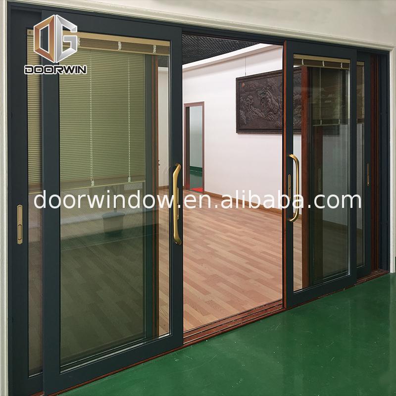 DOORWIN 2021Factory direct price colored glass sliding doors bypass door buy online