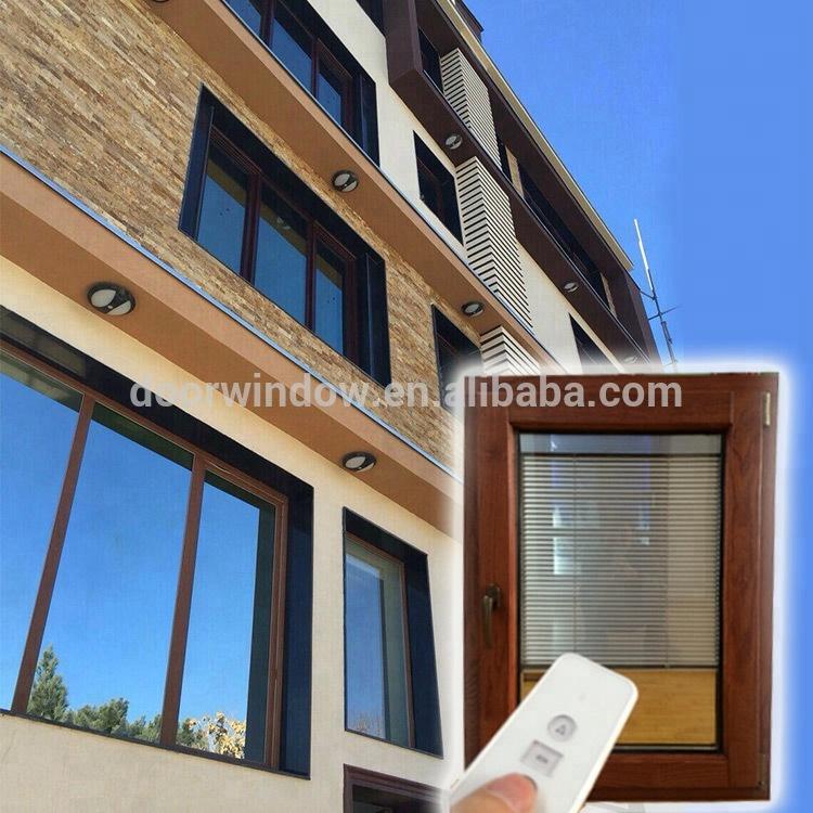 DOORWIN 2021Factory sale price prehung windows thermal break aluminum window with interior red oak wood claddingby Doorwin