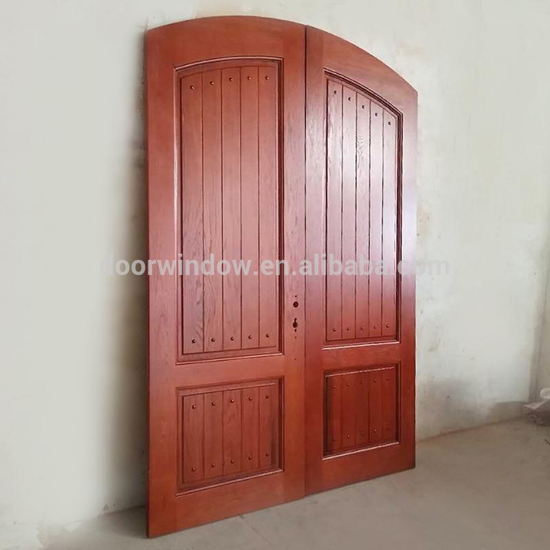 Doorwin 2021Finished product house front main double door design made of red oak wood flat solid wood doors by Doorwin