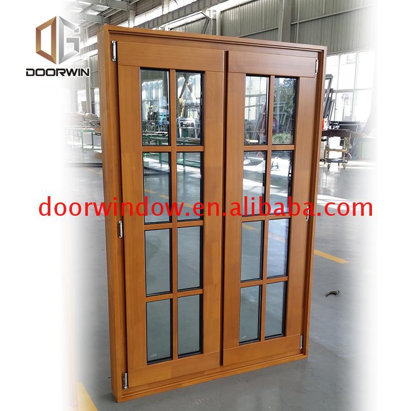 DOORWIN 2021Grill door designs india design wood window glass windows by Doorwin on Alibaba