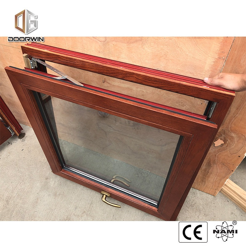 Doorwin 2021Hawaii Aluminium and wood inward door glass tilt and turn window Wood cladding aluminium tilt and turn window with handle
