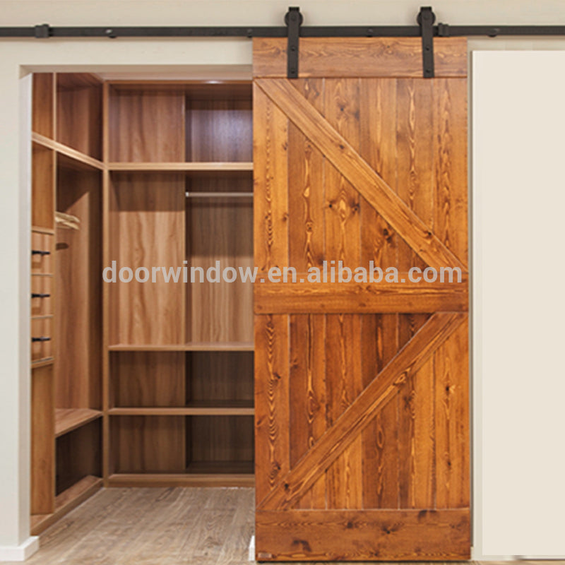 Doorwin 20212019 high quality latest design red oak hanging sliding barn door with wooden sliding door roller