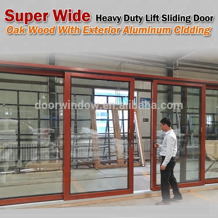 Doorwin 2021Super wide lift sliding door solid oak with exterior aluminum cladding sliding door system from China brand