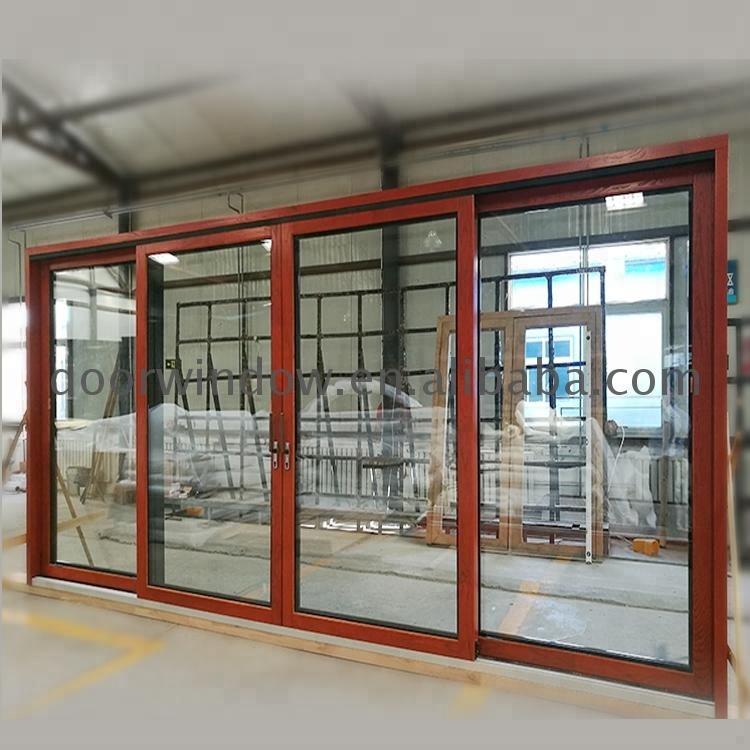 DOORWIN 2021Montreal Painted glass wardrobe sliding door outside front doors office system by Doorwin on Alibaba
