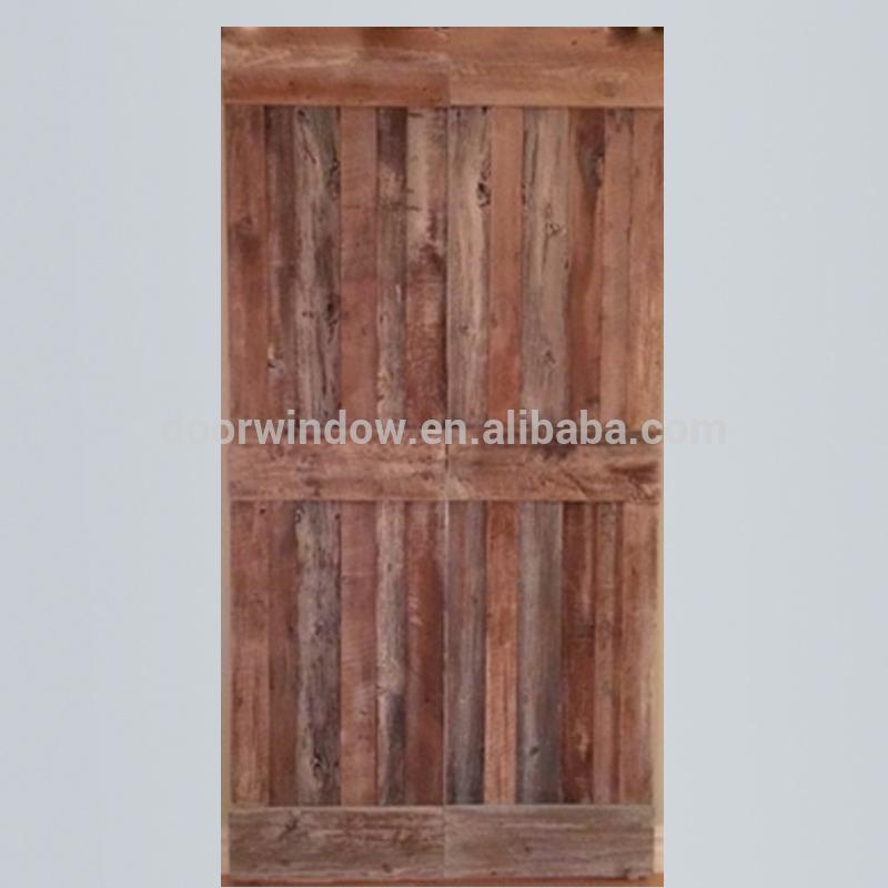 DOORWIN 2021Movable plank panel wooden doors design catalogue surface stained sliding barn door for partition by Doorwin