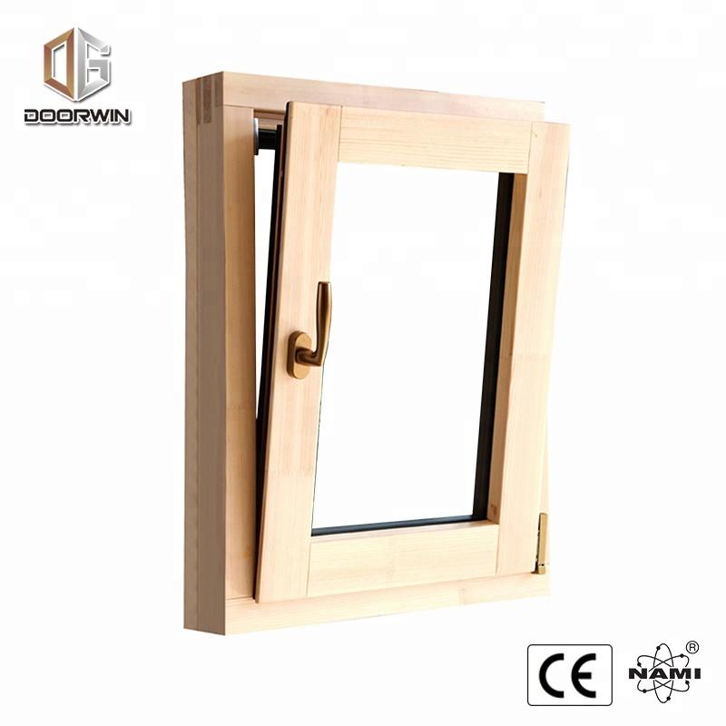 DOORWIN 2021NAMI Certified floor to ceiling windows cost flat roof wood windowsby Doorwin on Alibaba