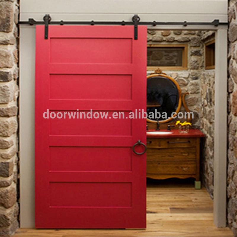 DOORWIN 2021Nice looking American sliding barn door X type made of pine wood by Doorwin