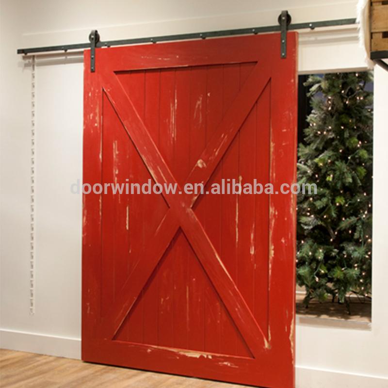 DOORWIN 2021Nice looking American sliding barn door X type made of pine wood by Doorwin