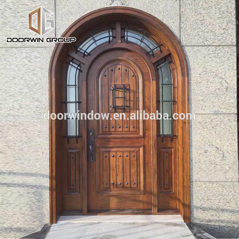 DOORWIN 2021North America popular front french doors round top design with decorative wrought iron clavos by Doorwin
