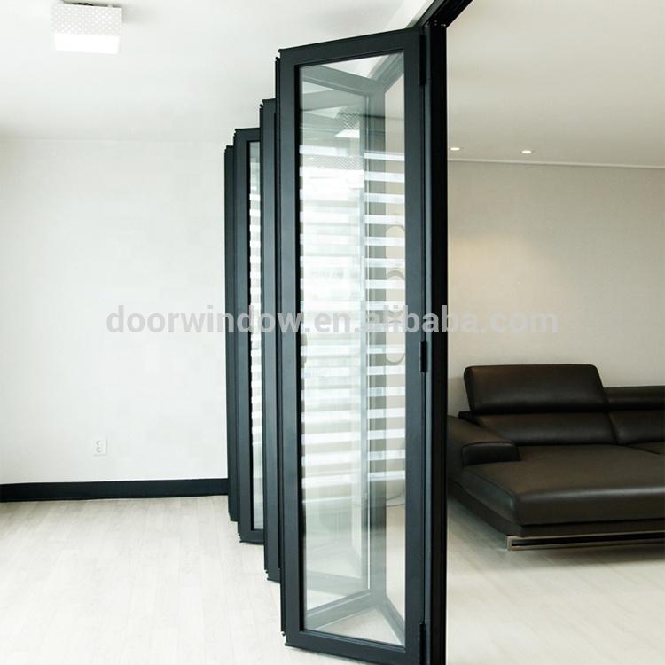 DOORWIN 2021Order from china direct main entrance doors design double glass bi-folding door with low-e coating by Doorwin
