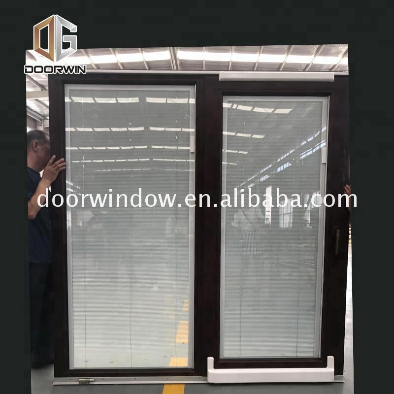 DOORWIN 2021Sliding door with tempered glazing philippines price and design remote control glass by Doorwin on Alibaba