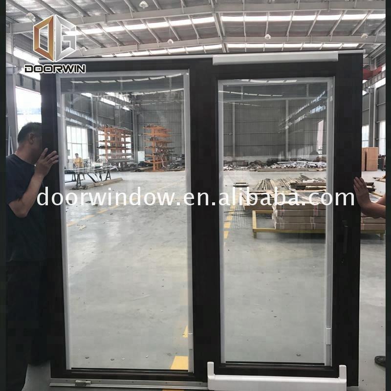 DOORWIN 2021Sliding garage doors with stainless steel net mosquito by Doorwin on Alibaba