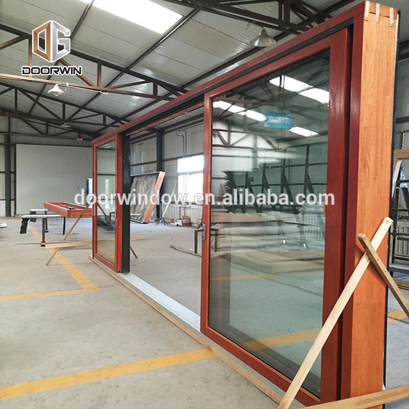 DOORWIN 2021Sliding gate door wooden almirah designs wheels by Doorwin on Alibaba