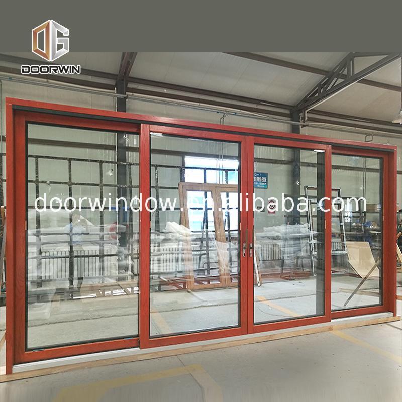 DOORWIN 2021Sliding gate door wooden almirah designs wheels by Doorwin on Alibaba