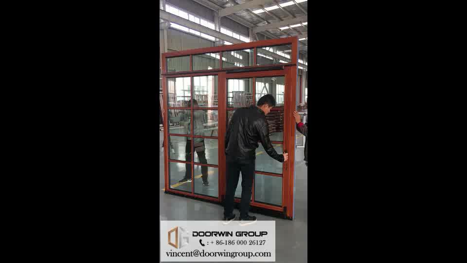 DOORWIN 2021Wooden solid wardrobe sliding door philippines price and design by Doorwin on Alibaba