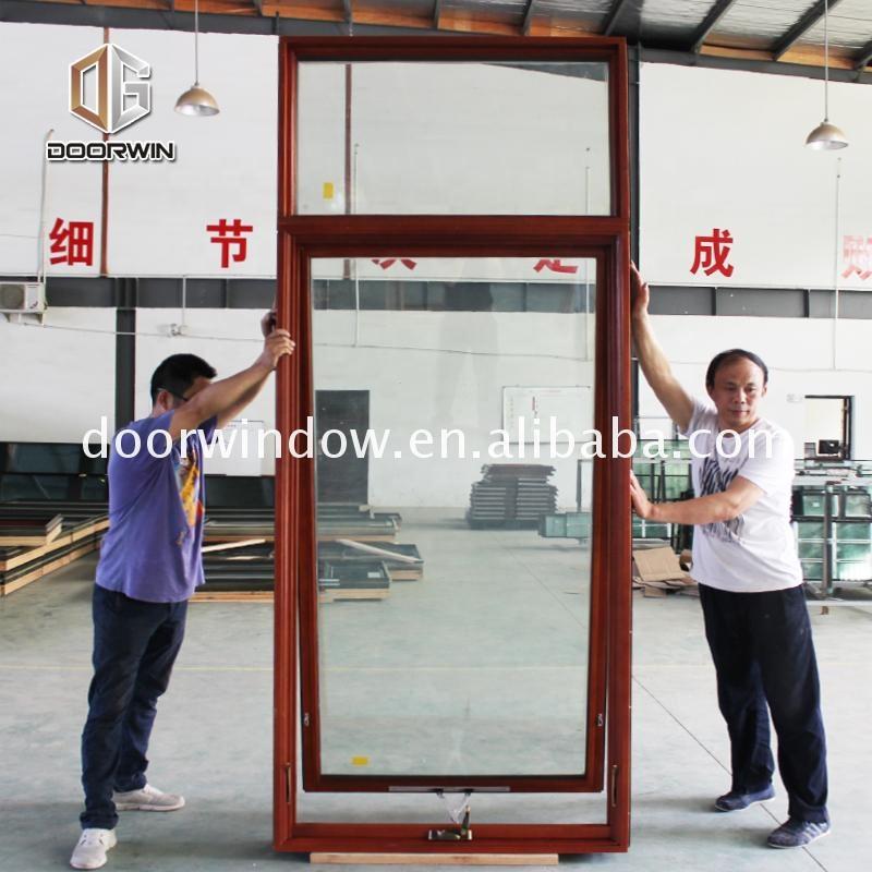 DOORWIN 2021Triple glazed aluminium timber wood crank windows with factory price by Doorwin on Alibaba
