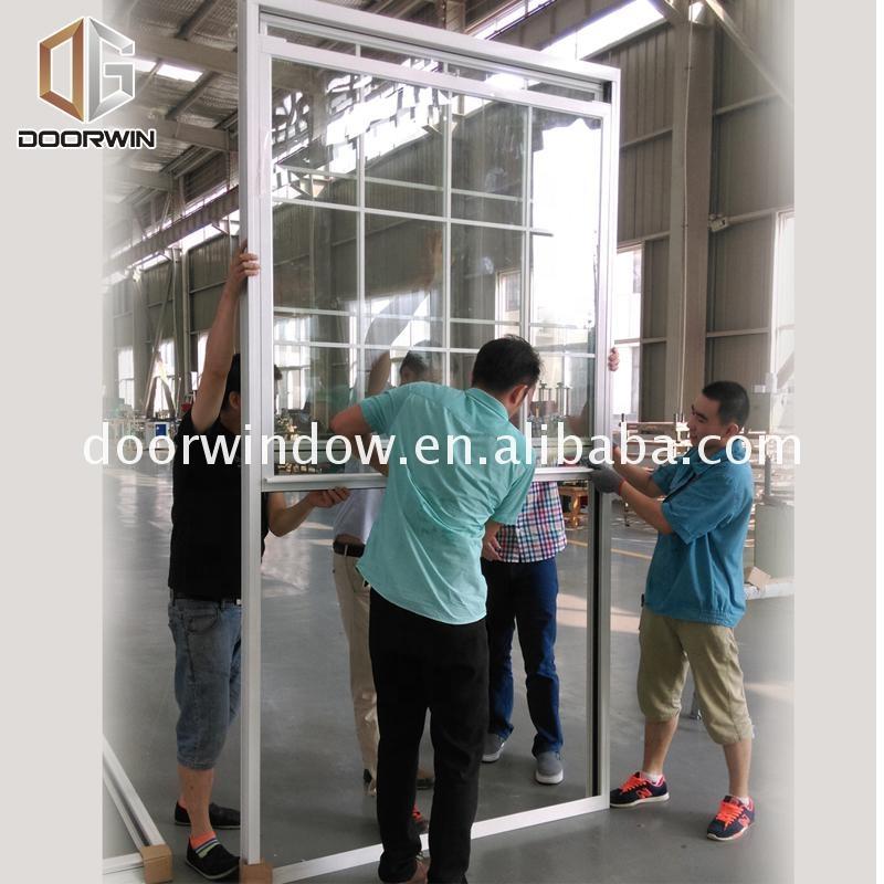 DOORWIN 2021Ultra clear glass single triple hung alu windows by Doorwin on Alibaba