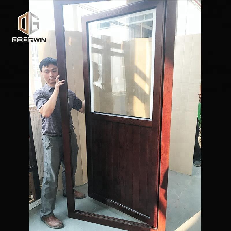 DOORWIN 2021Used wood exterior doors ultra clear glass louver door timber louvers by Doorwin on Alibaba