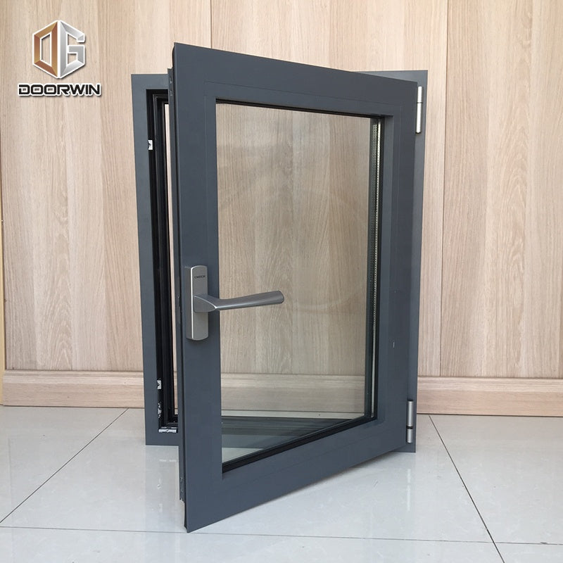 Doorwin 2021Germany Made black hardmare Wooden material wind proof tilt and turn aluminium window and doors