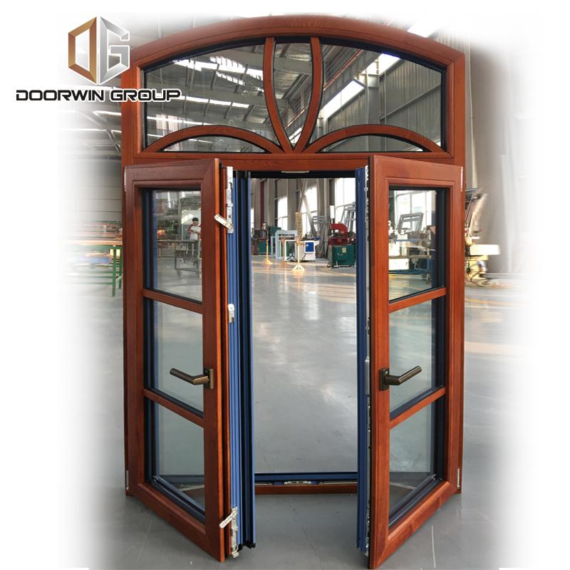 Doorwin 2021Arched thermal break aluminum window with oak wood cladding from inside, casement French window with grill design