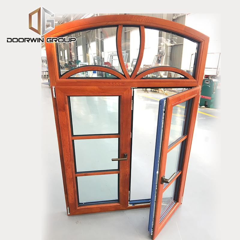 Doorwin 2021Arched thermal break aluminum window with oak wood cladding from inside, casement French window with grill design