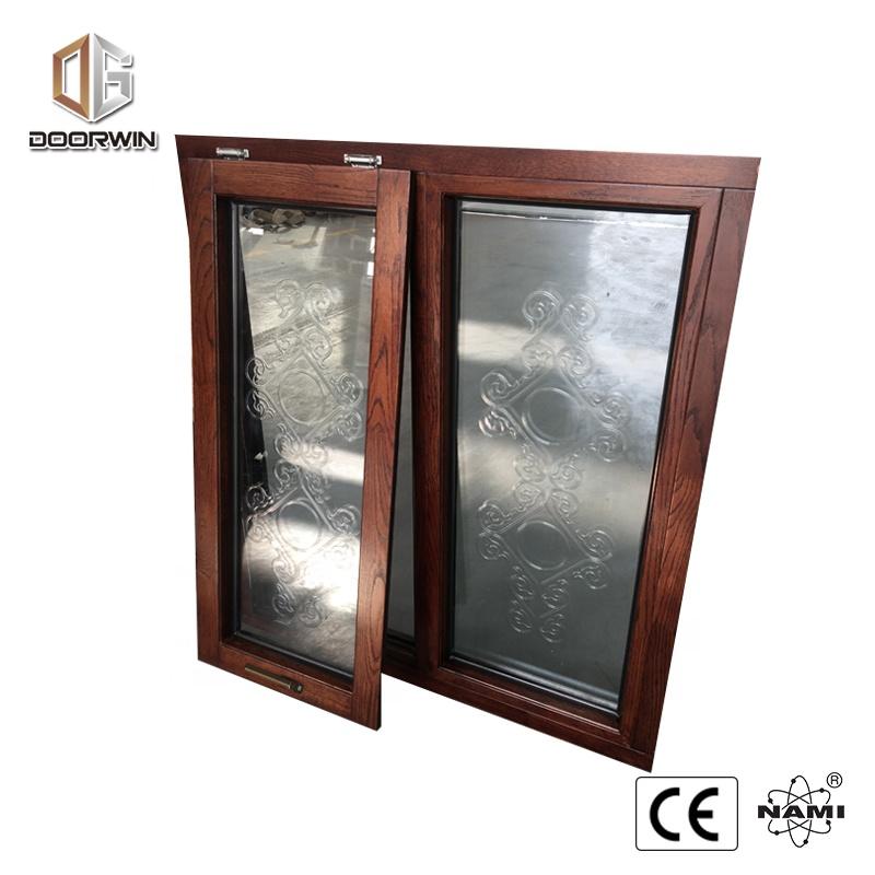 DOORWIN 2021vertical pivot openning aluminum awning top hung windowsvertical hinged window by Doorwin on Alibaba