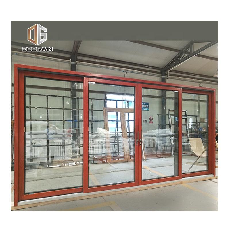 DOORWIN 2021wood aluminum frame balcony commercial automatic sliding glass doors by Doorwin on Alibaba