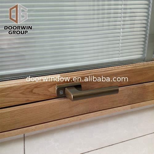 DOORWIN 2021wood frame shutters awning window by Doorwin on Alibaba